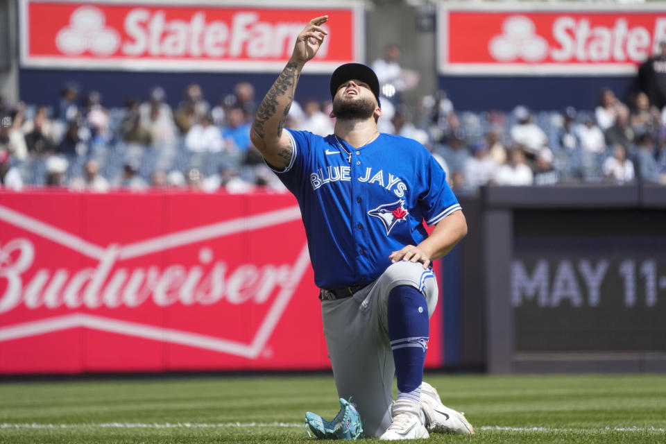 Toronto Blue Jays pitcher Alek Manoah prays before the start of a baseball game against the New York Yankees, Saturday, April 22, 2023, in New York. (AP Photo/Mary Altaffer)