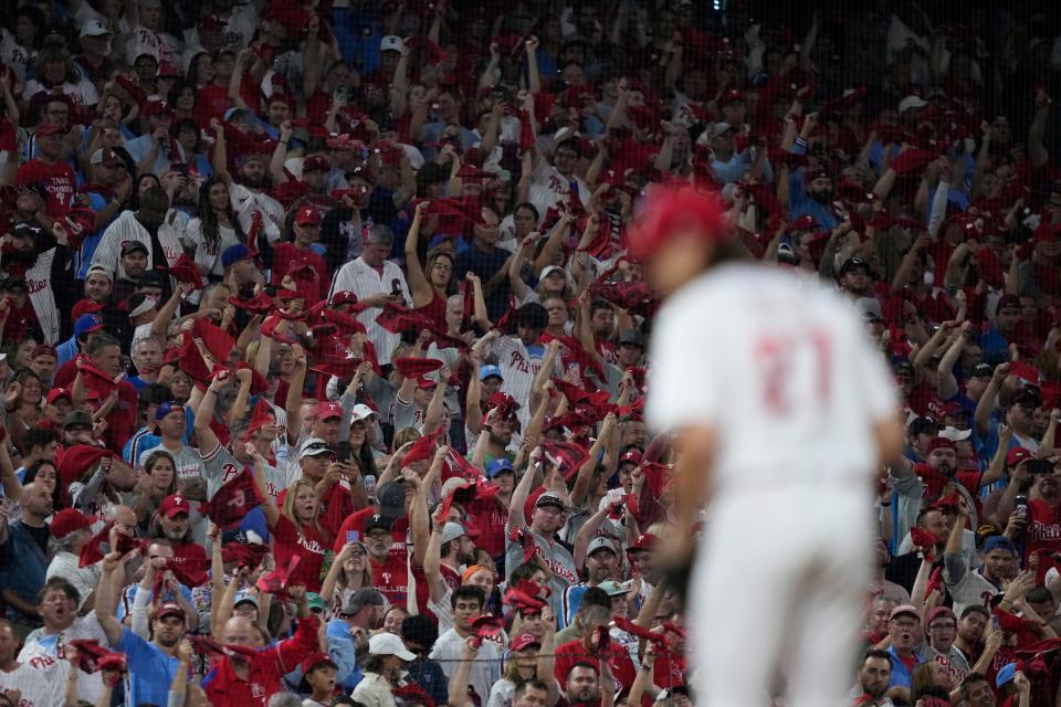 Fans cheer as Philadelphia Phillies' Aaron Nola plays during Game 2 in an NL wild-card baseball playoff series, Wednesday, Oct. 4, 2023, in Philadelphia.