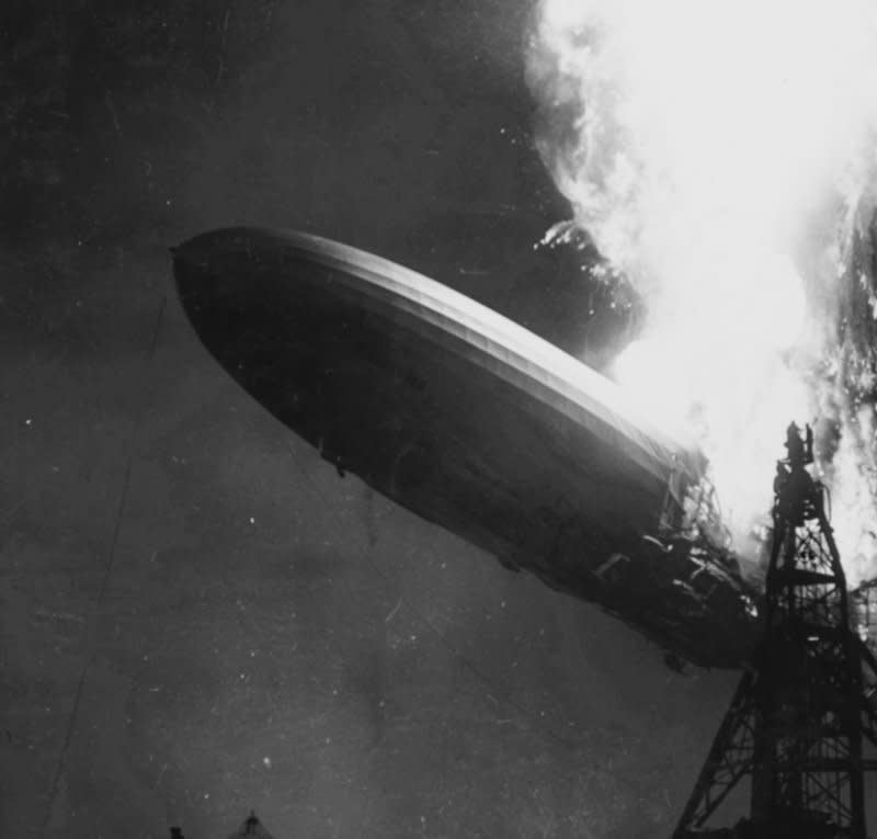 The largest manmade object ever to fly, the 800-foot airship Hindenburg erupts in a fireball at Lakehurst, N.J., on its arrival from Europe on May 6, 1937. Static electricity ignited the airship's flammable fabric skin, and 37 seconds later the airship crashed to the ground, killing 35 of its 97 passengers and crew. This spectacle ended the era of the passenger airship. Photo by Sam Shere/INS/UPI