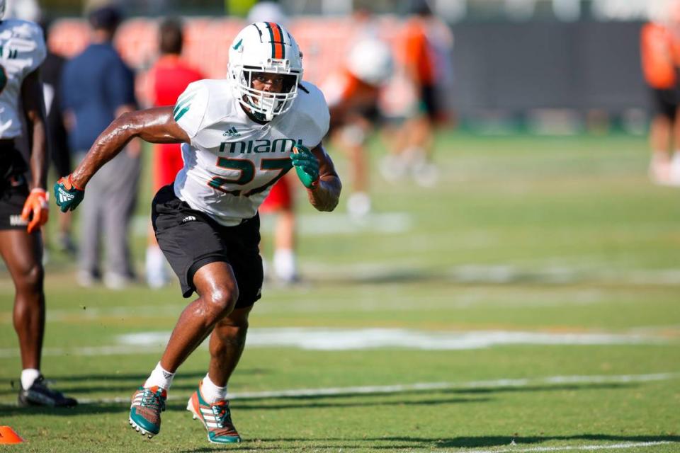 Miami Hurricanes safety Brian Balom (27) works out during football practice at the University of Miami campus in Coral Gables, Florida, Tuesday, April 4, 2023.