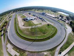 New Smyrna Speedway is a high-banked half-mile oval five miles west of New Smyrna Beach, in Samsula.