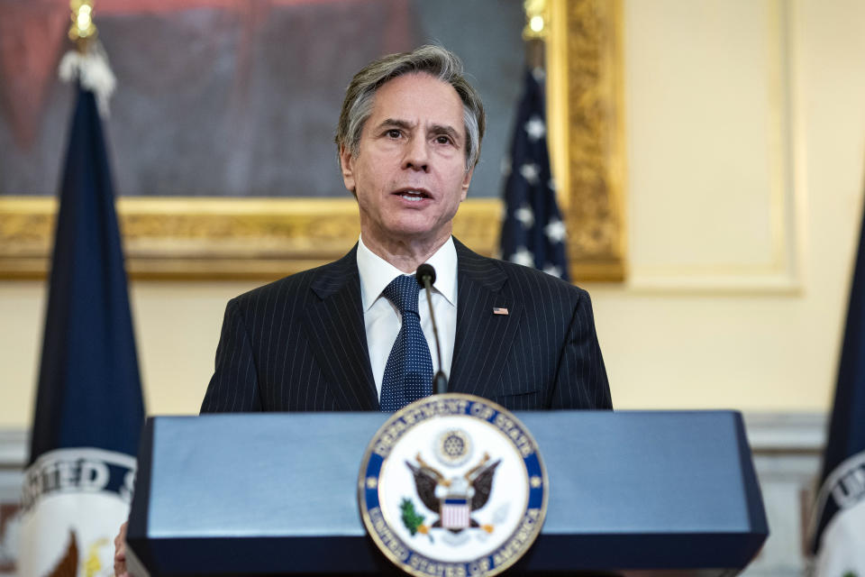 Secretary of State Antony Blinken announces his appointment of Gayle Smith as the new State Department Coordinator for Global COVID-19 Response and Health Security as he speaks about U.S. leadership in fighting the coronavirus pandemic at the State Department in Washington, Monday, April 5, 2021. (Al Drago/Pool via AP)