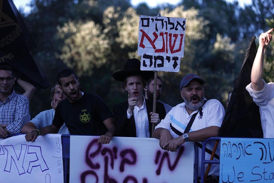 A protest against the Gay Pride parade in Jerusalem on July 21, 2016. <a href="https://www.gettyimages.com/detail/news-photo/israeli-right-wing-religious-jews-take-part-in-a-protest-news-photo/578328184?phrase=israel%20protest%20gay%20march%20orthodox&adppopup=true" rel="nofollow noopener" target="_blank" data-ylk="slk:Ahmad Gharabli/AFP via Getty Images;elm:context_link;itc:0;sec:content-canvas" class="link ">Ahmad Gharabli/AFP via Getty Images</a>