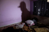 <p>The shadow of a member of the Iraqi Army’s 9th Armoured Division is seen in a room used as a cell for men, inside a compound used as a prison by Islamic State militants in the 17 Tamuz (July 17) district, in western Mosul, Iraq, June 6, 2017. (Alkis Konstantinidis/Reuters) </p>