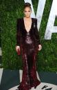 <p>Lopez's sequined merlot-hued gown made a statement at the <em>Vanity Fair</em> Oscars party. </p>