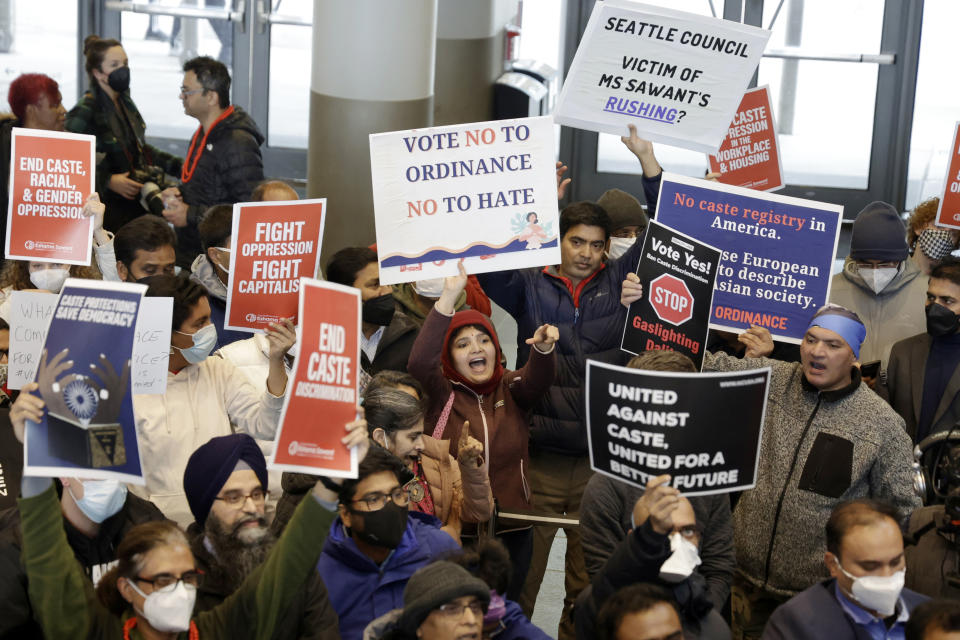 FILE - Supporters and opponents attempt to out yell each other during a rally at Seattle City Hall regarding a proposed ordinance to add caste to Seattle's anti-discrimination laws, Tuesday, Feb. 21, 2023, in Seattle. In February, Seattle became the first U.S. city and the first jurisdiction outside South Asia to add caste to its anti-discrimination laws. (AP Photo/John Froschauer, File)