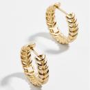If bling isn't your thing, opt for this beautiful braided pair of gold earrings instead. The hypoallergenic design boasts a shiny gold-plated finish and plays well with hoops and huggies of all textures and sizes. $38, Baublebar. <a href="https://www.baublebar.com/product/58474-paola-earrings" rel="nofollow noopener" target="_blank" data-ylk="slk:Get it now!" class="link ">Get it now!</a>
