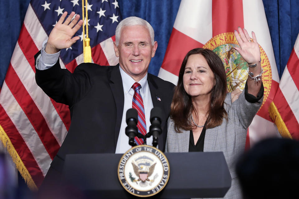 Vice President Mike Pence, left, and his wife Karen greet supporters at a campaign event Thursday, Jan. 16, 2020, in Kissimmee, Fla. (AP Photo/John Raoux)