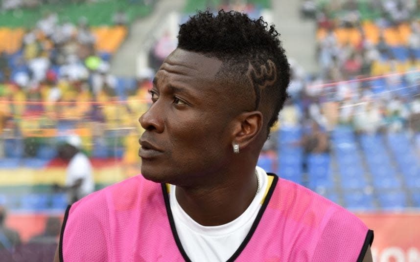 Former Sunderland striker Asamoah Gyan found guilty of having 'unethical hair' 