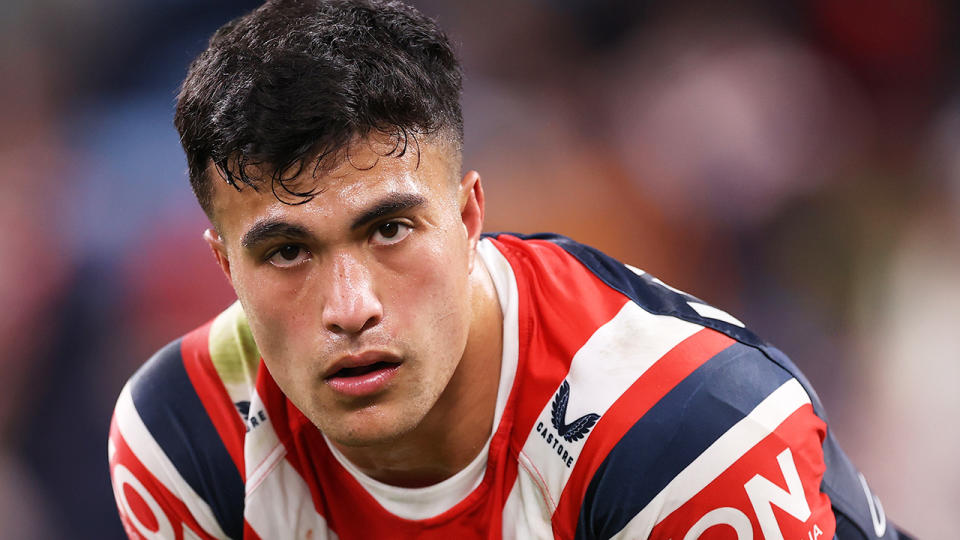 Joseph Suaalii is pictured playing for the Sydney Roosters.