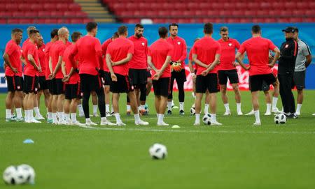 Soccer Football - World Cup - Poland Training - Kazan Arena, Kazan, Russia - June 23, 2018 Poland coach Adam Nawalka instructs players during training REUTERS/John Sibley