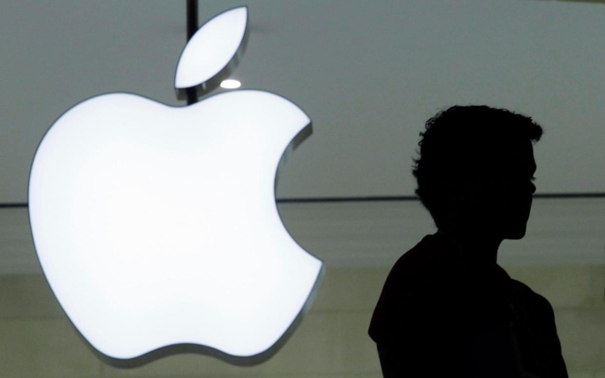 Apple logo - Mark Lennihan/ AP