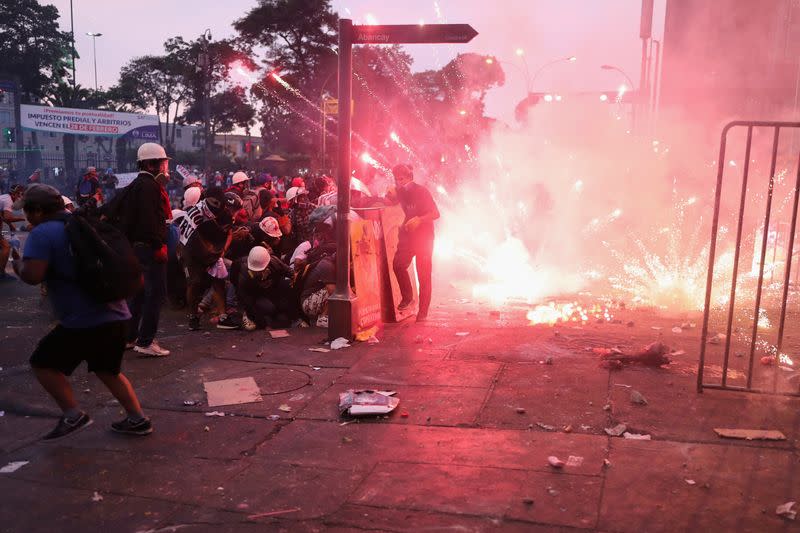 Demonstrators protest to demand President's step down, in Lima