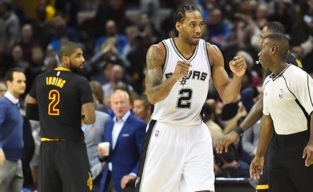 Jan 21, 2017; Cleveland, OH, USA; San Antonio Spurs forward Kawhi Leonard (2) celebrates after the San Antonio Spurs beat the Cleveland Cavaliers 118-115 at Quicken Loans Arena. Mandatory Credit: Ken Blaze-USA TODAY Sports