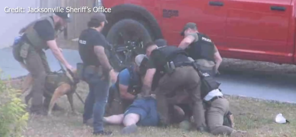Austin Maddox being tackled to the ground during arrest