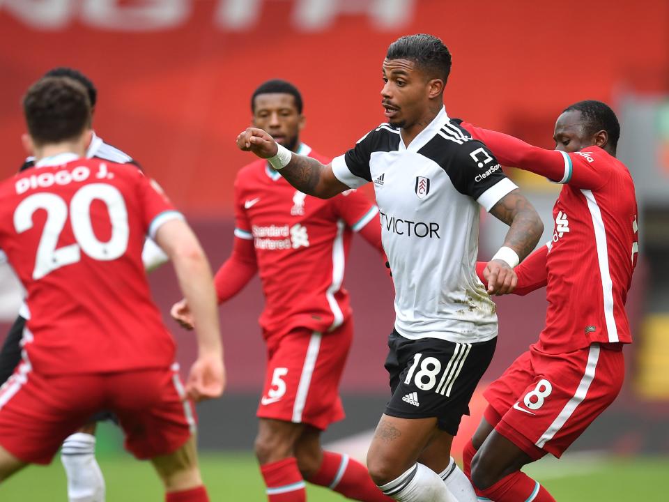 Fulham goalscorer Mario Lemina is surrounded by Liverpool players (Getty Images)