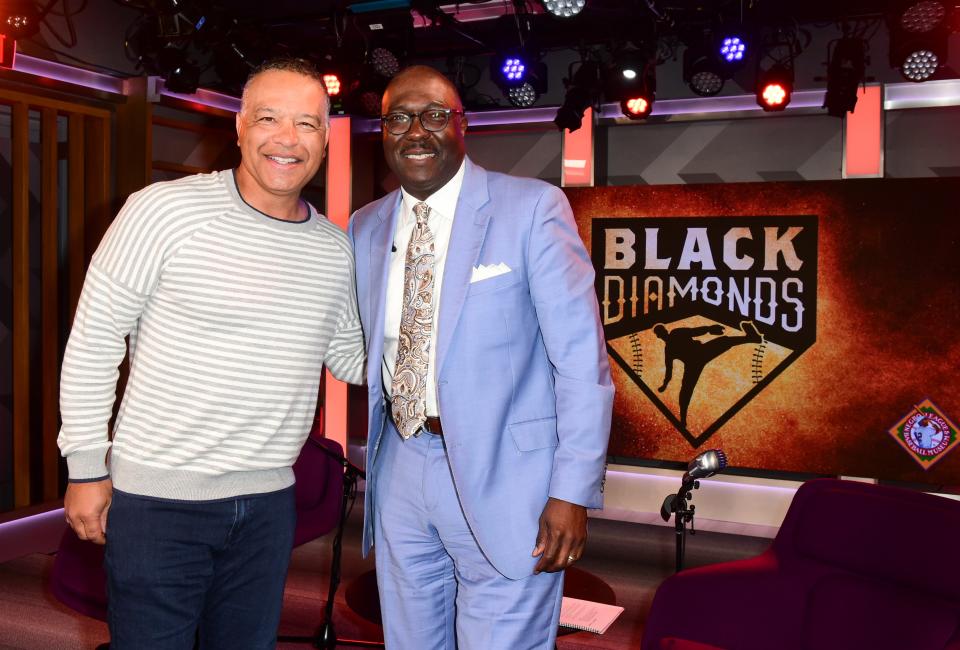 Kendrick and Dodgers' manager Dave Roberts