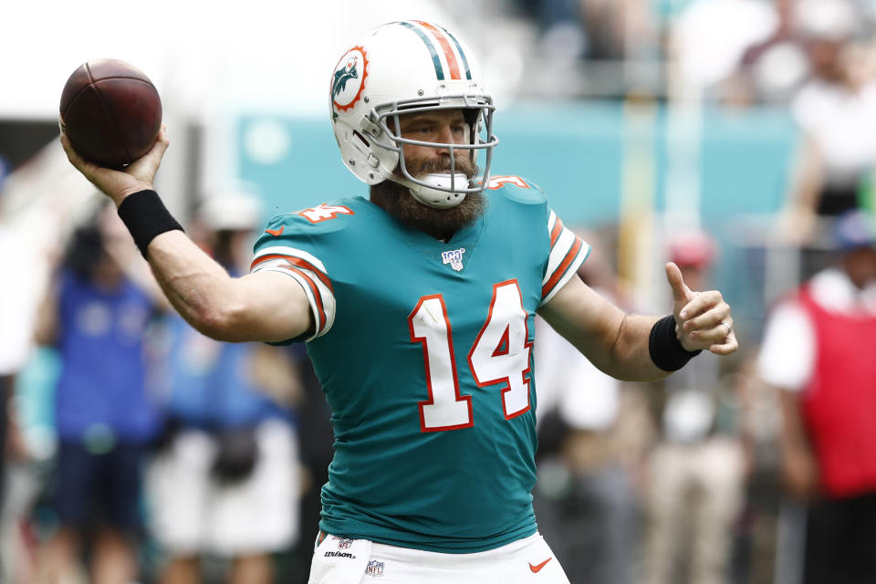 Miami Dolphins quarterback Ryan Fitzpatrick (14) looks to pass, during the first half at an NFL football game against the Philadelphia Eagles, Sunday, Dec. 1, 2019, in Miami Gardens, Fla. (AP Photo/Brynn Anderson)