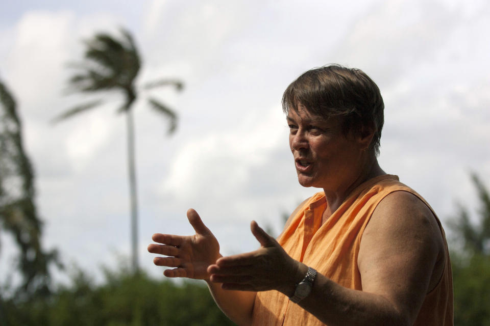 In this Sept. 28, 2015 file photo, Hawaii Institute of Marine Biology director Ruth Gates talks about her project to create "super coral" near her lab on Coconut Island in Kaneohe, Hawaii. Gates, who dedicated much of her career to saving the world's fragile and deteriorating coral reefs, has died at age 56. The University of Hawaii, where Gates was the director of the Hawaii Institute of Marine Biology, said Tuesday, Oct. 30, 2018, that the researcher died in Honolulu on Thursday, Oct. 25, 2018. (AP Photo/Caleb Jones, File)