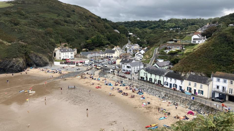 Llangrannog is a popular spot in Ceredigion, West Wales. Release date April 29 2024. A retired teacher who refused to pay an English-only parking fine in Wales could face a £10,000 legal bill. Language campaigner Toni Schiavone will appear in court in Aberystwyth for the fourth time on May 13. It is over his refusal to pay an English-only parking charge notice - after the parking company One Parking Solution won an appeal to reintroduce the case in January. This is despite the judge, Gareth Humphreys, warning that the company should carefully consider the value of continuing with a case that has already been 
