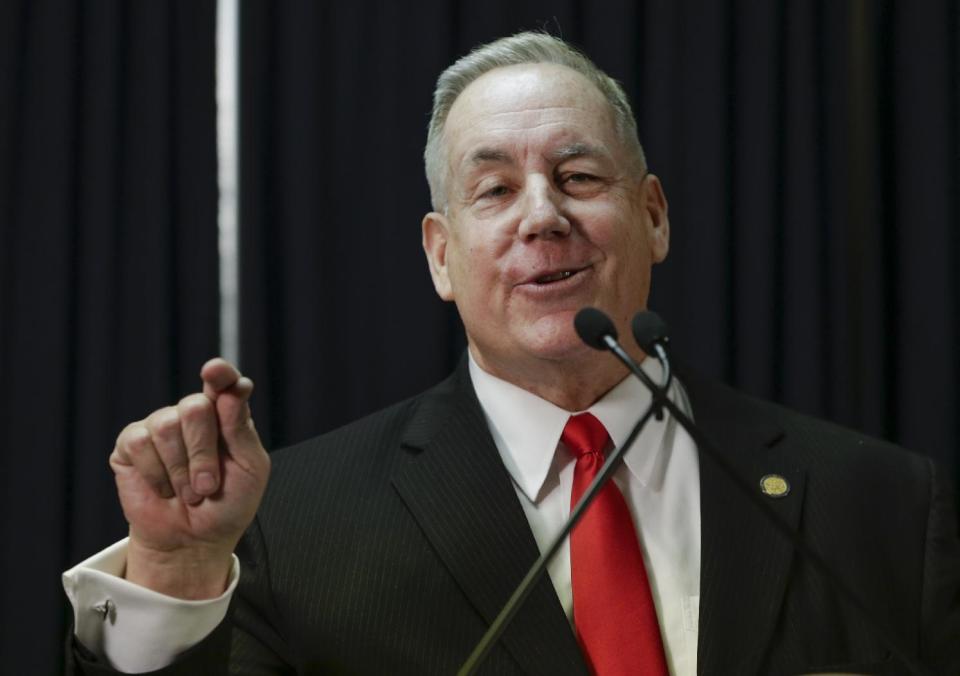 Nebraska state Sen. Bill Kintner of Papillion announces at a news conference in Lincoln, Neb., Wednesday, Jan. 25, 2017, that he is resigning the seat he has held since 2012, following an uproar over a tweet he sent that implied Women's March protesters were too unattractive to be victims of sexual assault. He made the announcement less than an hour before Nebraska lawmakers were scheduled to debate whether to expel him. (AP Photo/Nati Harnik)