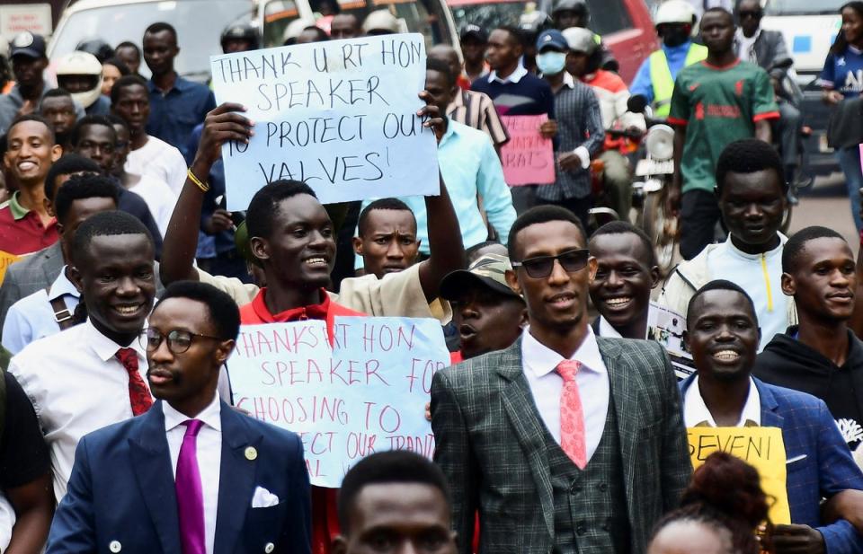 Ugandan students supporting Uganda’s parliament and president over new anti-LGBT+ laws (REUTERS)