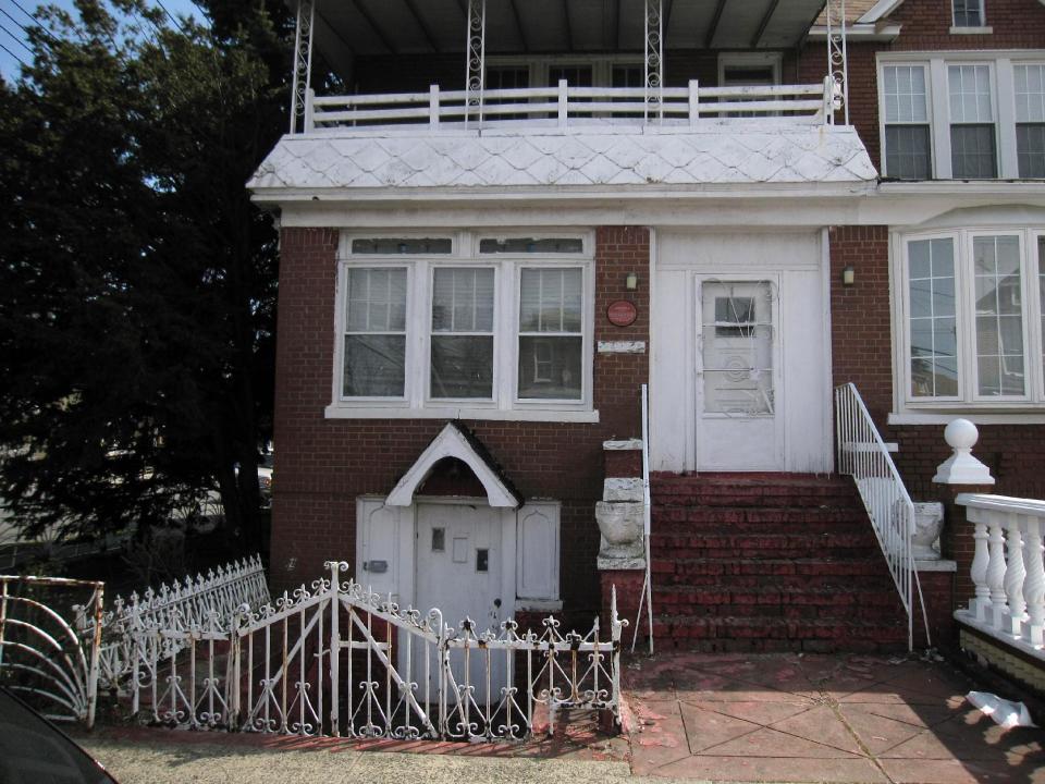 This April 7, 2013 image shows a house in the Brooklyn borough of New York where baseball great Jackie Robinson once lived. A plaque on the door says: “The first African-American major league baseball player lived here from 1947 to 1949.” A new movie, “42,” tells Robinson’s inspiring story as the man who integrated Major League Baseball. The house at 5224 Tilden Ave. in East Flatbush is one of a number of places in Brooklyn connected to Robinson. (AP Photo/Beth J. Harpaz)