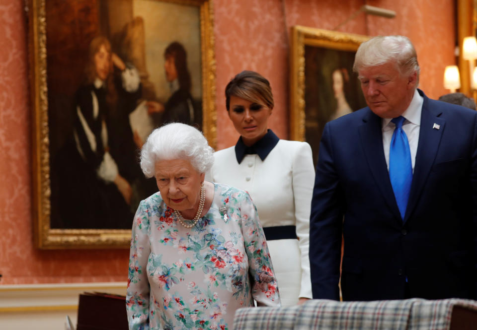 U.S. President Donald Trump, First Lady Melania Trump and Britain's Queen Elizabeth review items from the Royal Collection at Buckingham Palace, in London, Britain, June 3, 2019. REUTERS/Carlos Barria