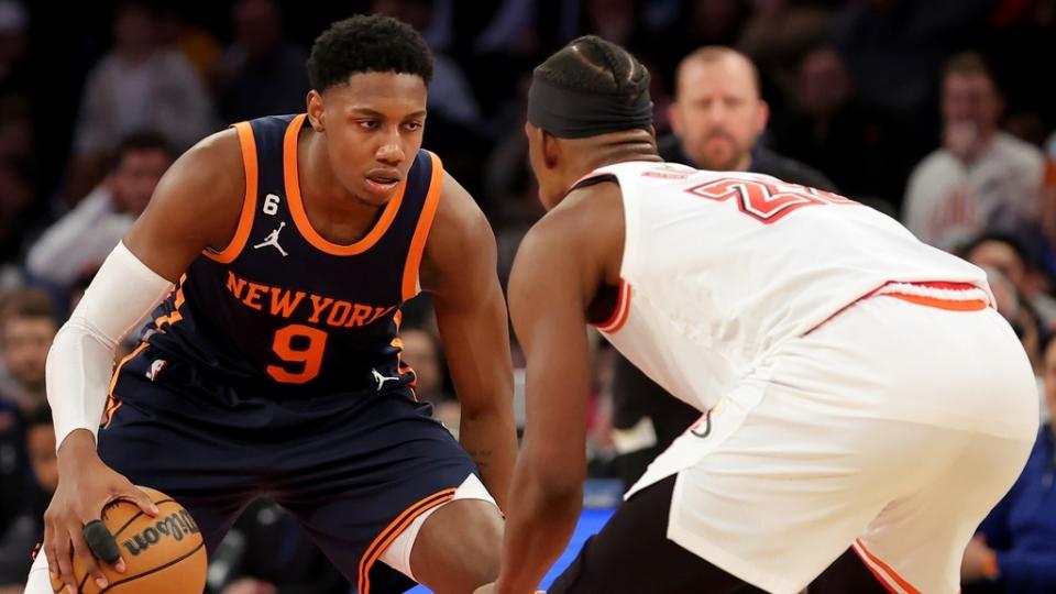 Feb 2, 2023; New York, New York, USA; New York Knicks guard RJ Barrett (9) controls the ball against Miami Heat forward Jimmy Butler (22) during the fourth quarter at Madison Square Garden.