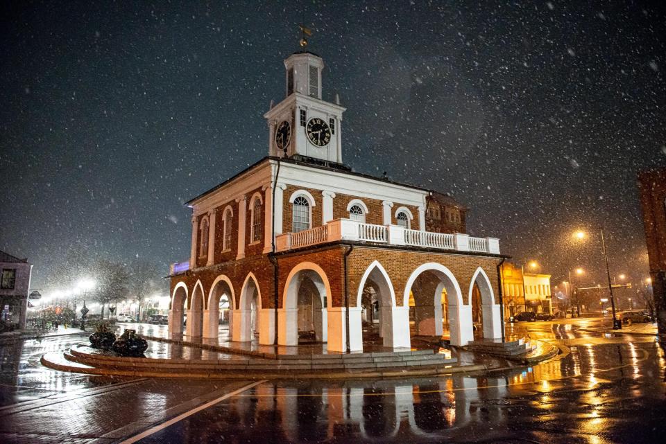 Snow falls on downtown Fayetteville on Thursday, February 20, 2020.