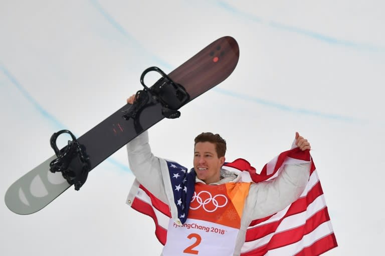 Shaun White celebrates after winning the Pyeongchang Olympics men's snowboard halfpipe final on Wednesday. It was White's third gold medal after the Turin Games in 2006 and Sochi four years later. It was also the 100th US Winter Olympics gold