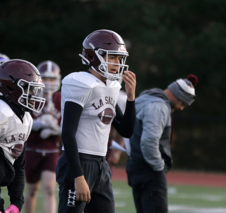 La Salle quarterback Dean Varrecchione, shown watching a game from the sideline last season, announced last week that he's committed to Robert Morris University.