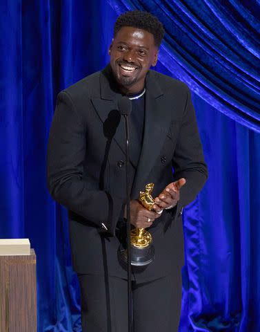 <p>Todd Wawrychuk/A.M.P.A.S. via Getty Images</p> Daniel Kaluuya wins his Oscar for 'Judas and the Black Messiah'