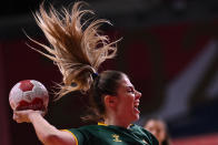 <p>Montenegro's centre back Matea Pletikosic shoots during the women's preliminary round group A handball match between Japan and Montenegro of the Tokyo 2020 Olympic Games at the Yoyogi National Stadium in Tokyo on July 27, 2021. (Photo by Daniel LEAL-OLIVAS / AFP)</p> 