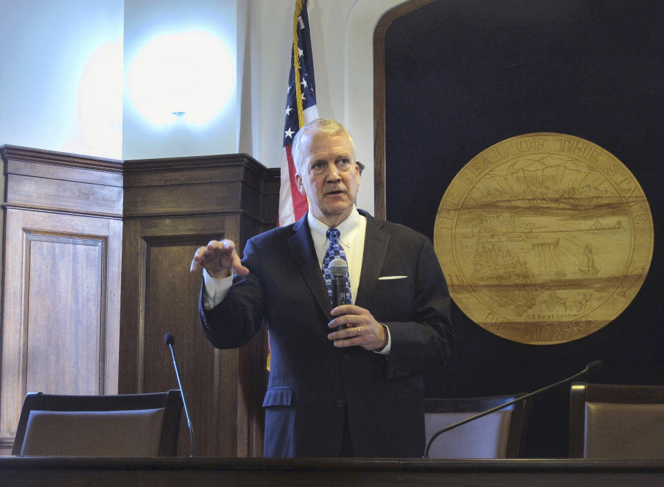 Alaska U.S. Sen. Dan Sullivan, a Republican, speaks to reporters after giving his annual address to state lawmakers on Tuesday, Feb. 7, 2023, in Juneau, Alaska. Sullivan and the other two members of Alaska's congressional delegation have expressed support for the development of a major oil project, known as the Willow project, in the National Petroleum Reserve-Alaska. (AP Photo/Becky Bohrer)