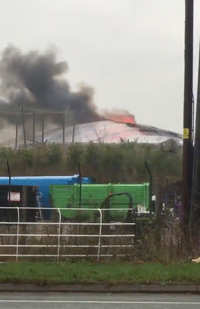 A fire is seen at Chester Zoo, Britain December 15, 2018 in this still image taken from a video obtained from social media. DAVID WEARING/via REUTERS