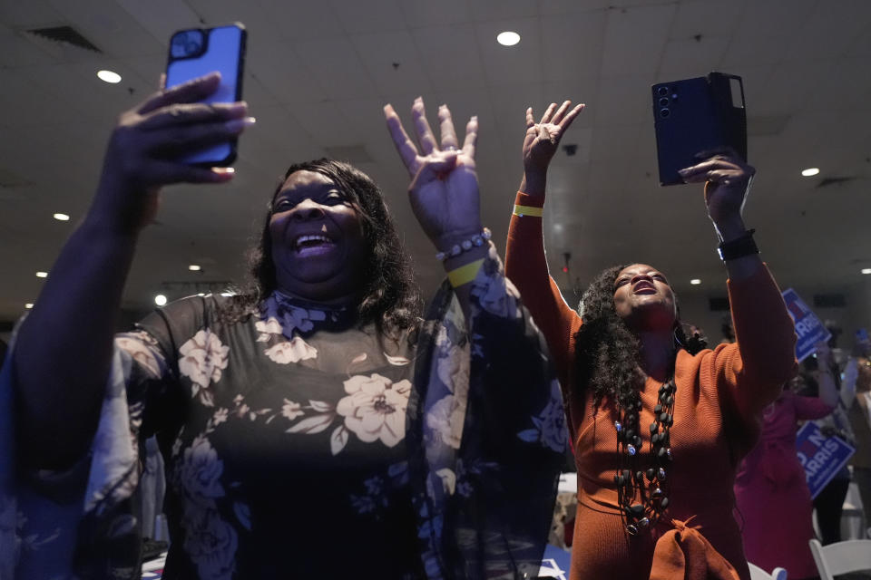 Audience members chant "Four more years" as President Joe Biden speaks at South Carolina's First in the Nation dinner at the South Carolina State Fairgrounds in Columbia, S.C., Saturday, Jan. 27, 2024. (AP Photo/Jacquelyn Martin)