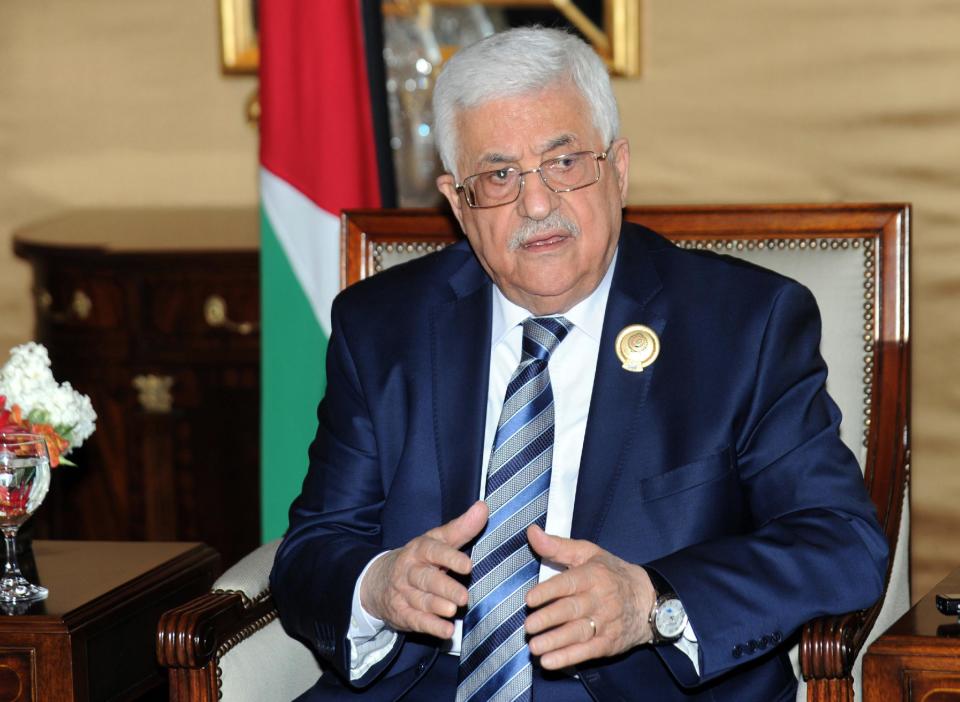 Palestinian President Mahmoud Abbas taks to journalists during a press conference on the sidelines of the Arab League Summit at Bayan Palace, Kuwait on Wednesday, March 26, 2014.(AP Photo/Nasser Waggi)