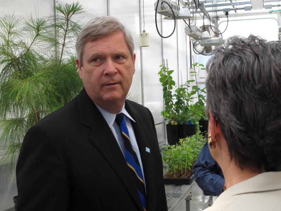 U.S. Agriculture Secretary Tom Vilsack gets a tour of a plant science lab at Penn State University on Wednesday, May 16, 2012 in State College, Pa. Vilsack visited the school to promote the importance of agricultural research. (AP Photo/Genaro C. Armas)