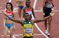 LONDON, ENGLAND - AUGUST 09: Caster Semenya of South Africa reacts after competing in the Women's 800m Semifinals on Day 13 of the London 2012 Olympic Games at Olympic Stadium on August 9, 2012 in London, England. (Photo by Clive Brunskill/Getty Images)