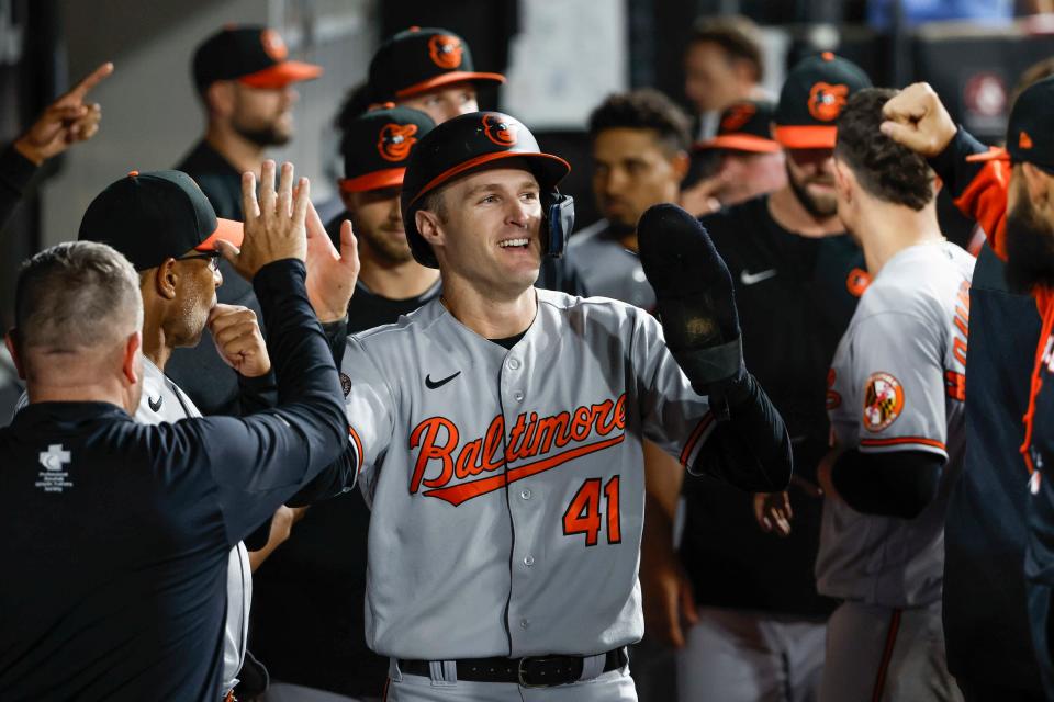 Tyler Nevin (41) celebrates after scoring against the Chicago White Sox on June 23.