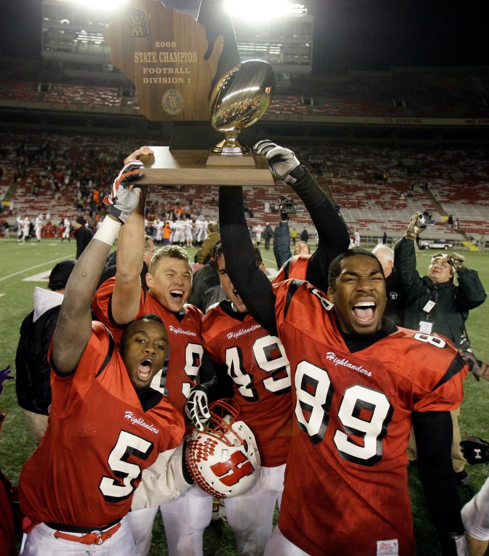Homestead's Shelby Harris (89) and Ben Gardner (49) celebrate after the Highlanders won the WIAA Division 1 state championship over Arrowhead in 2008. Both went on to be NFL draft picks.