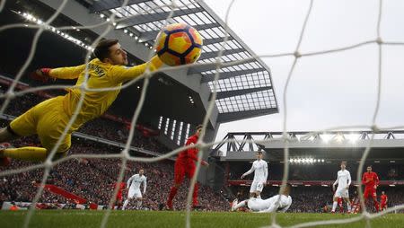 Britain Soccer Football - Liverpool v Swansea City - Premier League - Anfield - 21/1/17 Liverpool's Roberto Firmino scores their first goal Reuters / Phil Noble Livepic EDITORIAL USE ONLY.