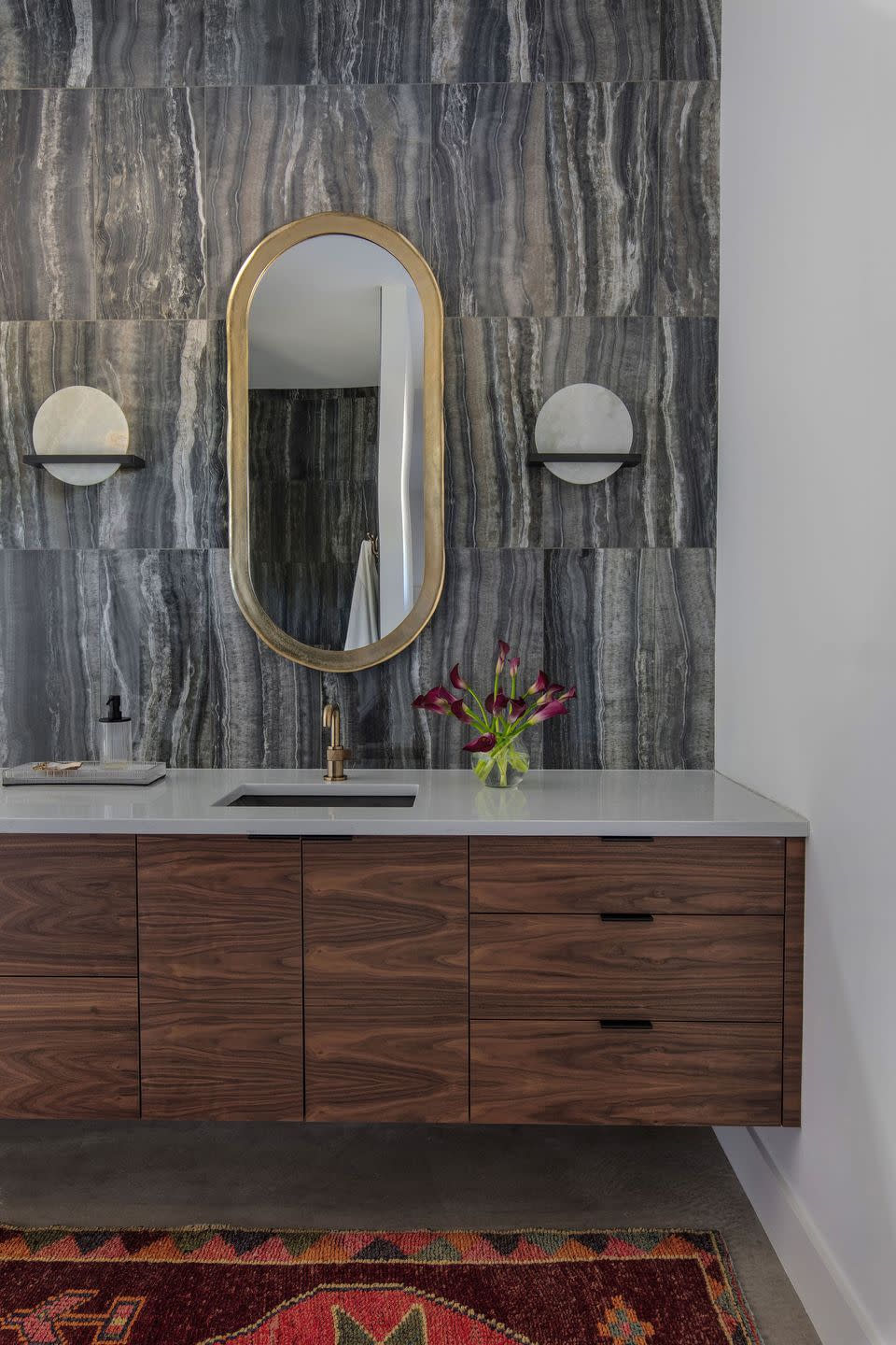 a bathroom with a large mirror