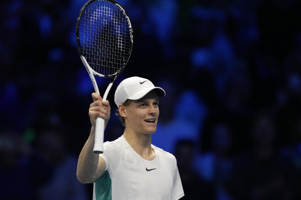 Italy's Jannik Sinner celebrates after winning against Greece's Stefanos Tsitsipas during the singles tennis match , of the ATP World Tour Finals at the Pala Alpitour, in Turin, Italy, Sunday, Nov. 12, 2023. (AP Photo/Antonio Calanni)