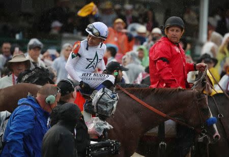 May 5, 2018; Louisville, KY, USA; Mike Smith aboard Justify (7) in the winner's circle during the 144th running of the Kentucky Derby at Churchill Downs. Mandatory Credit: Mark Zerof-USA TODAY Sports