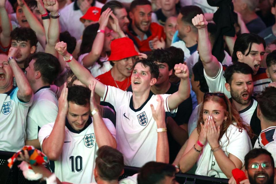 England fans celebrate their side’s second goal of the game at BOXPark Wembley, London, during a screening of the UEFA Euro 2024, semi final match, between England and the Netherlands (Nigel French/PA) (PA Wire)