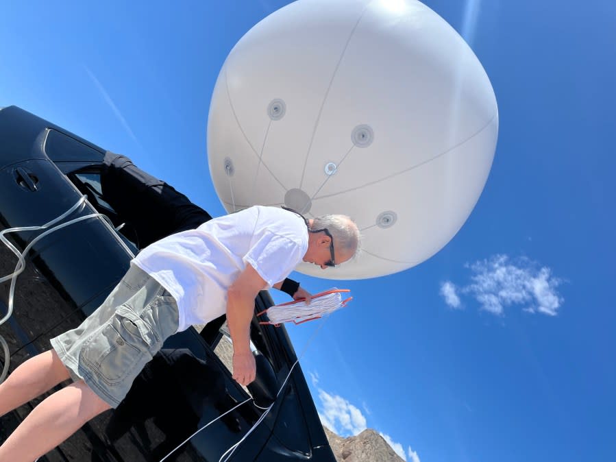 The seven-foot, white, helium balloon assembled by Jon Dorsey, owner of Mr. Balloon, was purchased by an unnamed Lone Mountain resident to illustrate the height of 216 feet, the current maximum height of a proposed Church of Jesus Christ of Latter-Day Saints temple. (KLAS)