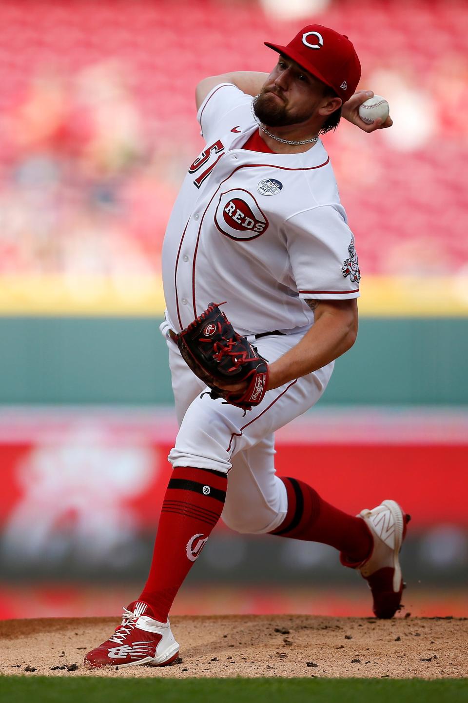 Cincinnati Reds starting pitcher Graham Ashcraft (51) throws a pitch in the first inning of the MLB National League game between the Cincinnati Reds and the Washington Nationals at Great American Ball Park in downtown Cincinnati on Thursday, June 2, 2022.