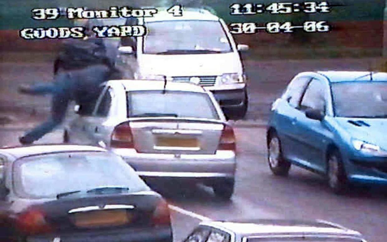 man being flung into the air as he tries to stop a thief stealing his car. PRESS ASSOCIATION Photo. Photo issue date Thursday May 4, 2006 - Merseyside Police/PA